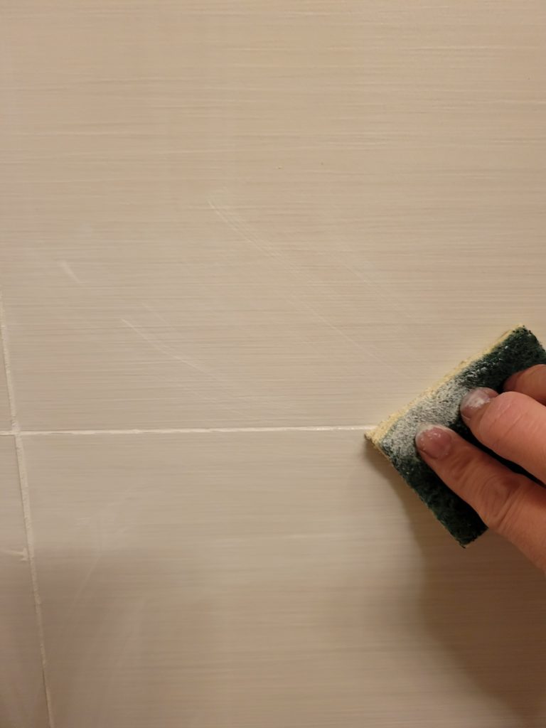 using sponge to paint grout